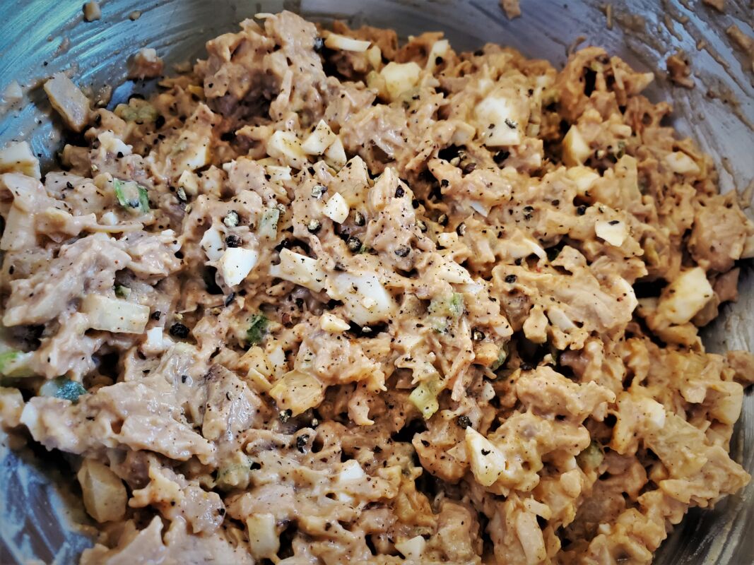 A picture of BBQ chicken salad in a bowl.